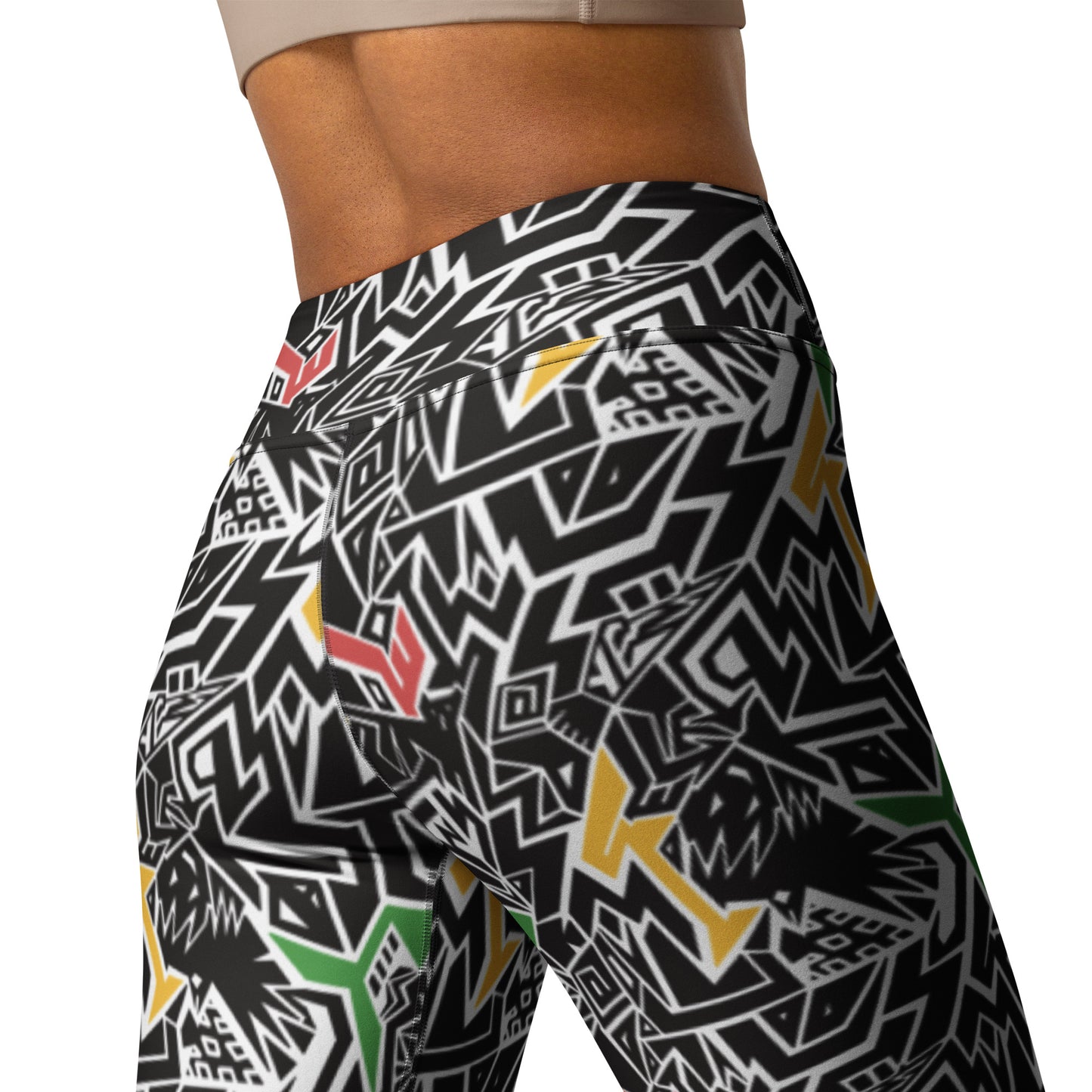 Red, gold, and green patterned leggings with hidden Smile At Life text, designed by Fowl Plays Print Emporium.