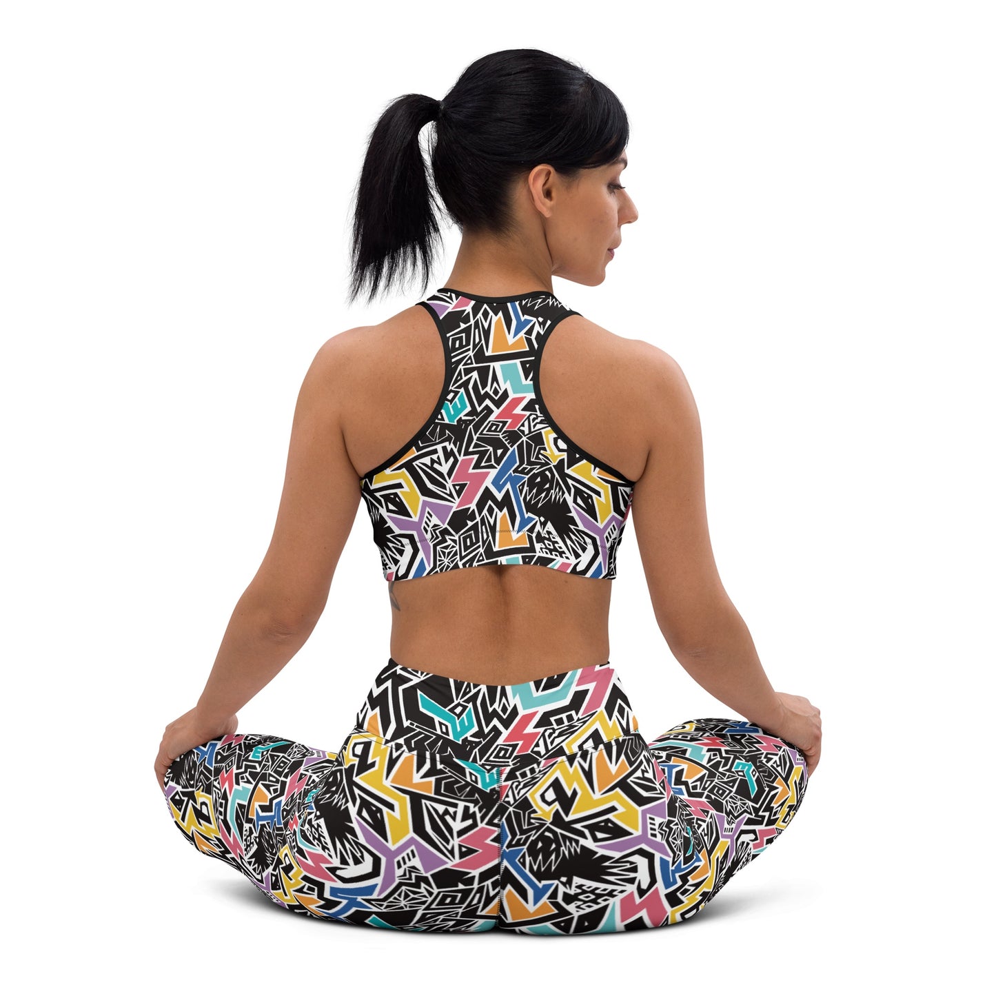 model wearing Rainbow patterned leggings and crop top with hidden ‘Smile At Life’ message, designed by Fowl Plays Print Emporium