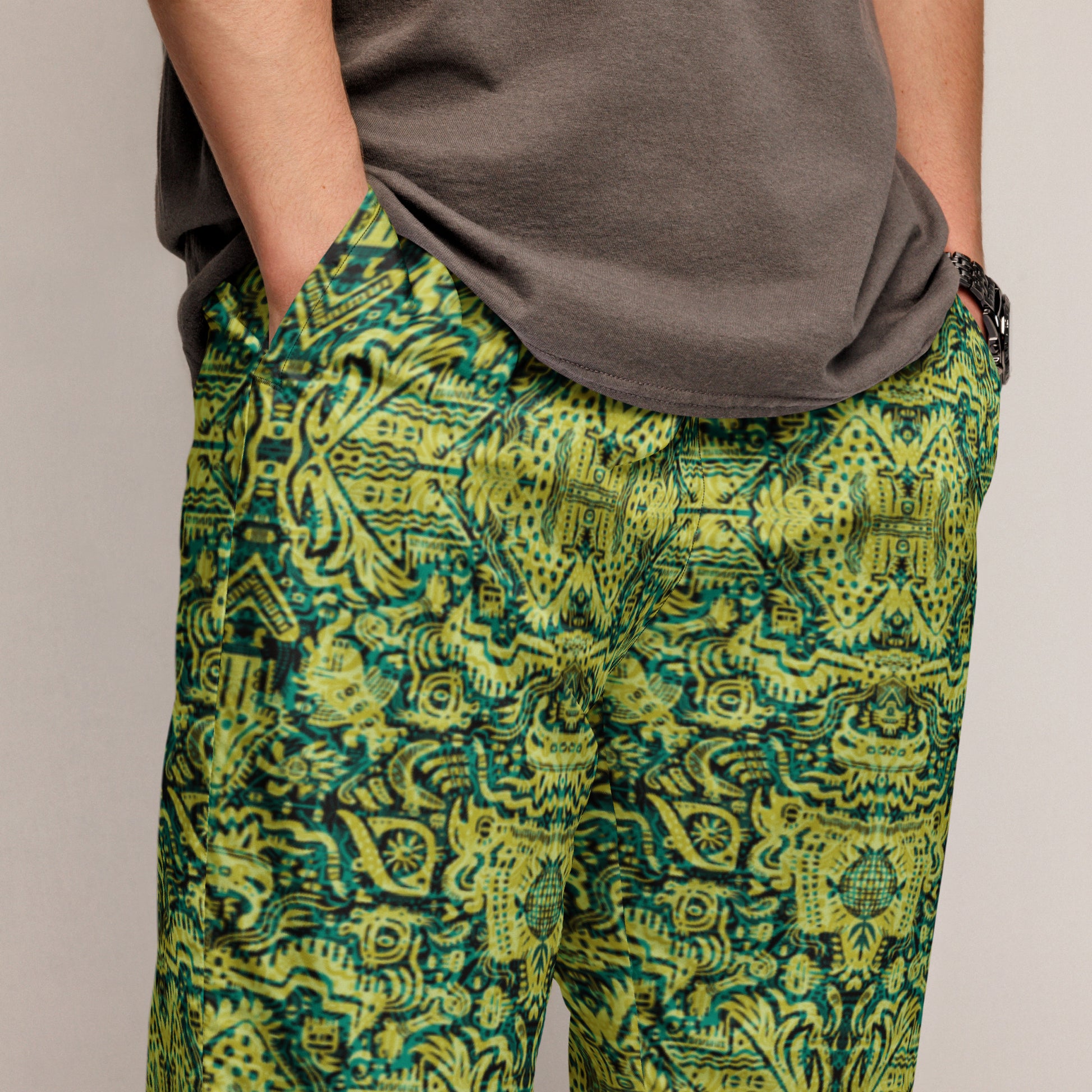 Green and lemon Ministry of Souls Joggers – unisex 90s dance festival streetwear by Fowl Plays Print Emporium