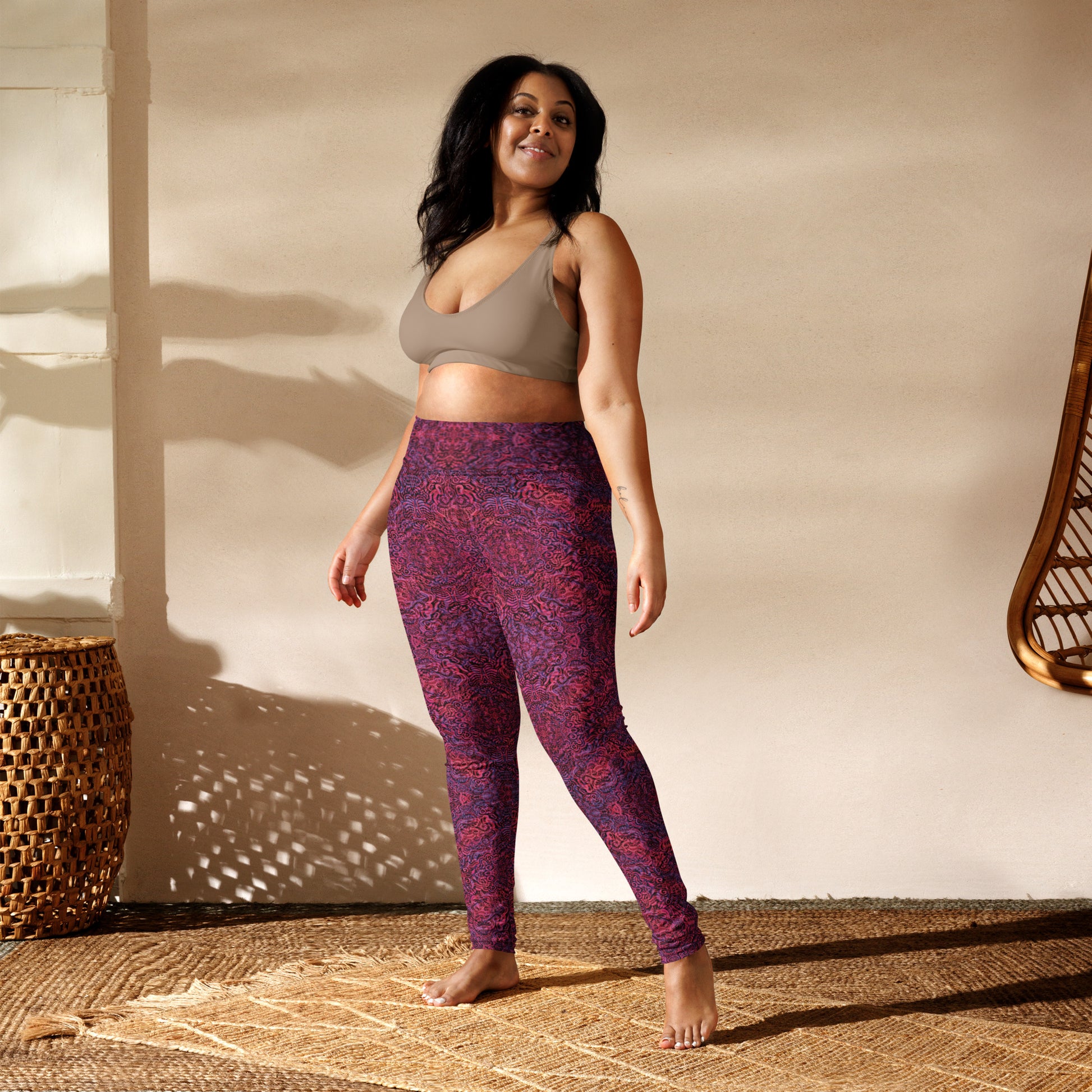 Magenta and purple patterned leggings featuring a bone-inspired design, exclusive to Fowl Plays Print Emporium. on plus size model.