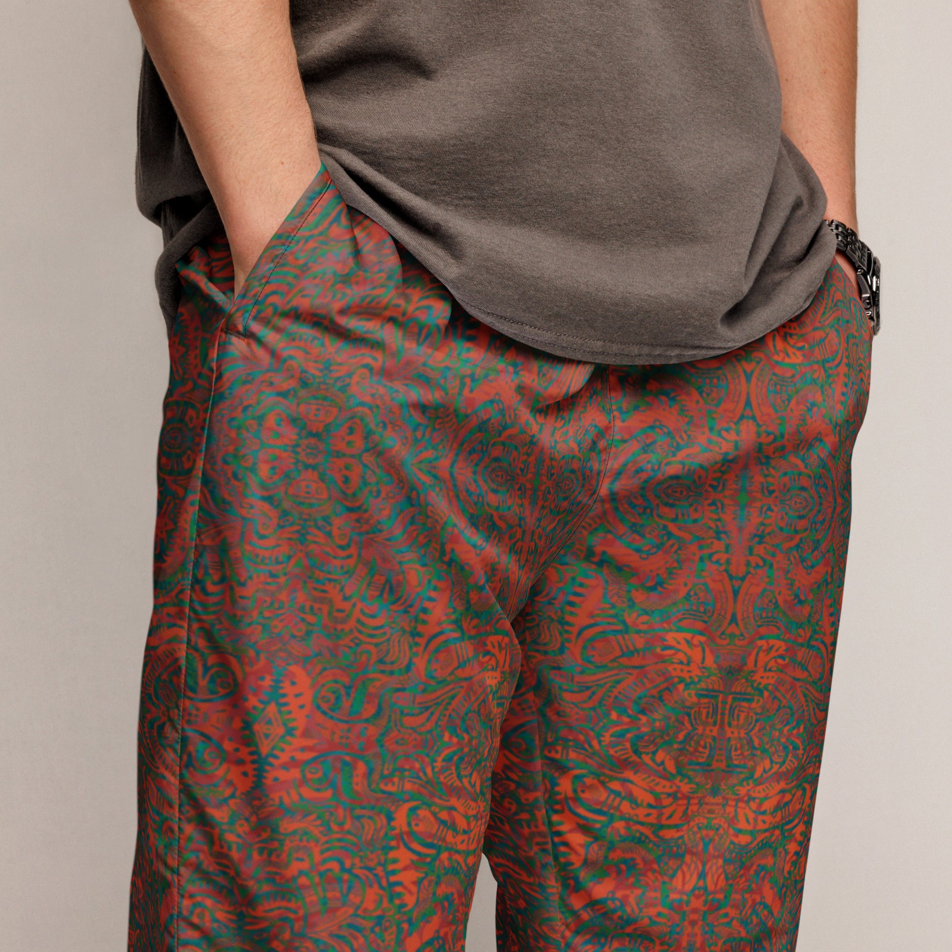 Orange, blue, and green Psychedelic Kaleidoscope Joggers – unisex festival streetwear by Fowl Plays Print Emporium