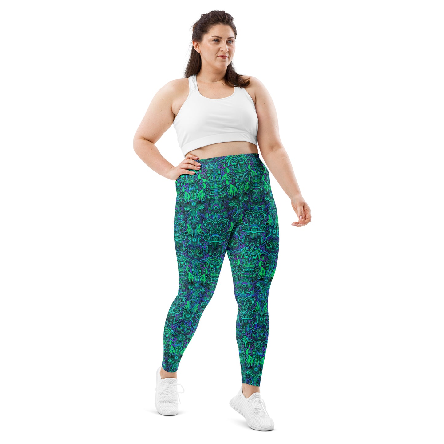Model wearing plus size turquoise and purple psychedelic yoga leggings by Fowl Plays