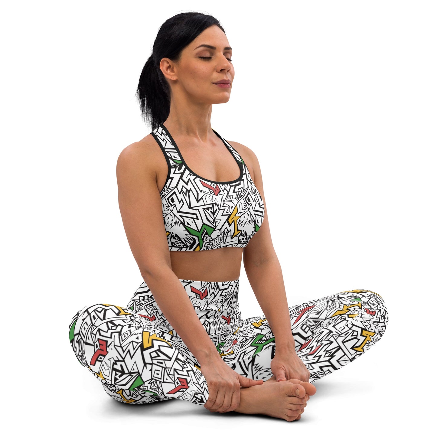 Black, white, red, gold and green psychedelic crop top and leggings with hidden “Smile At Life” message – exclusive sustainable design by Fowl Plays Print Emporium.