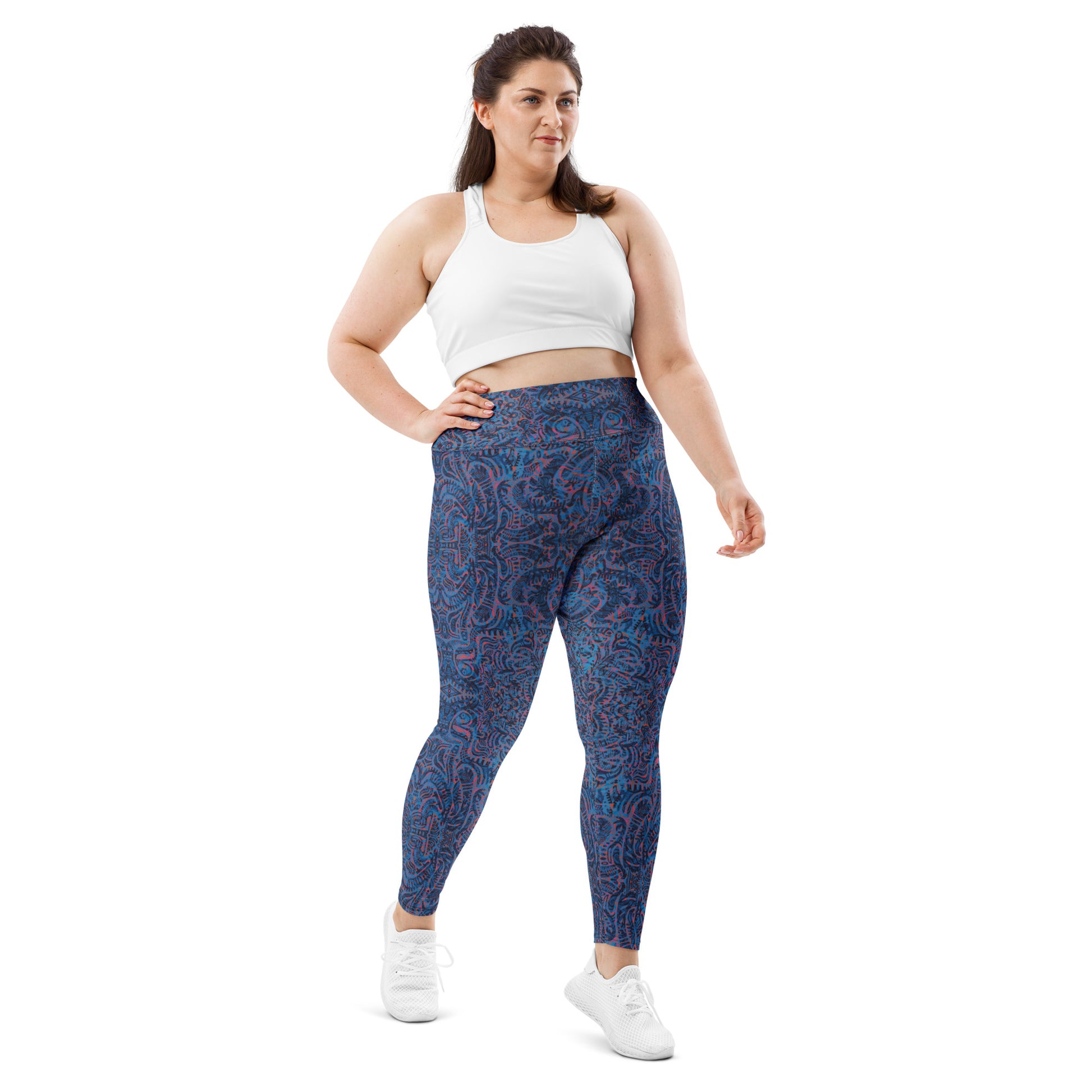Model wearing blue tribal patterned leggings plus size