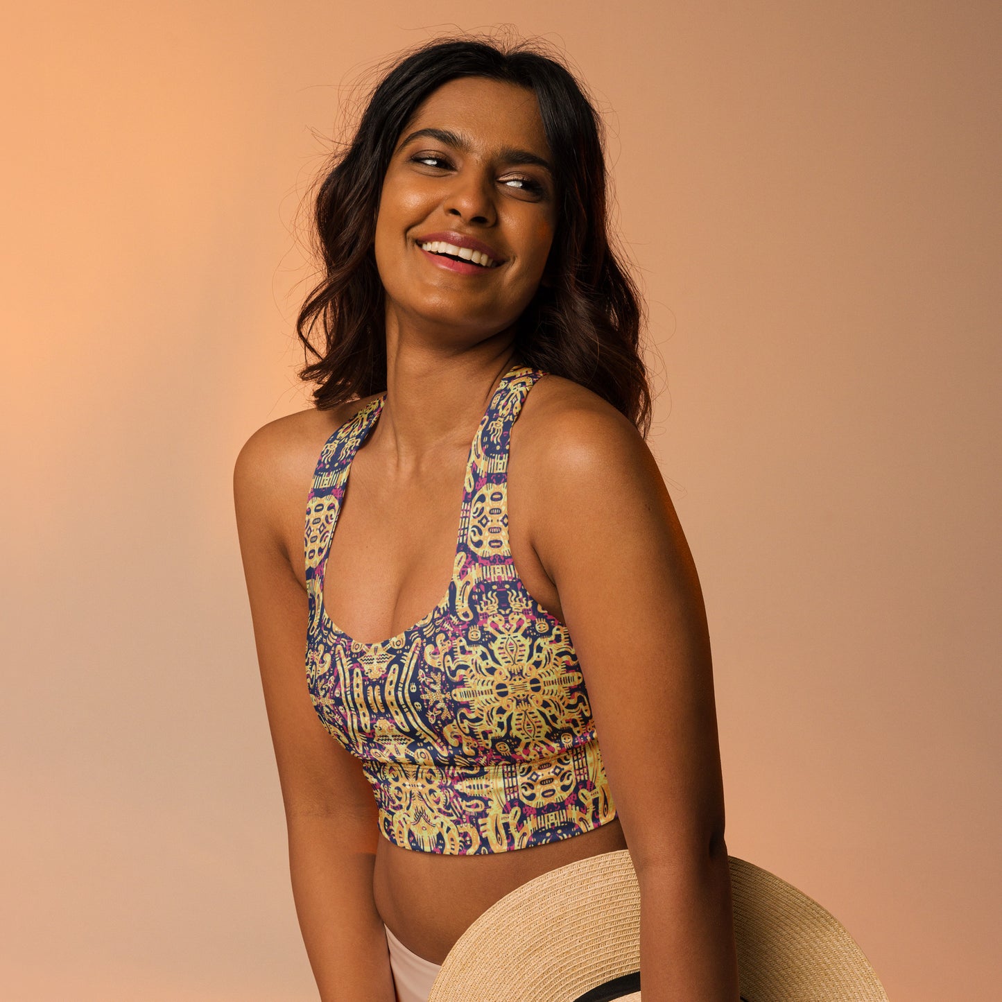 Blue, yellow and pink psychedelic crop top inspired by octopuses – exclusive ocean-themed design by Fowl Plays Print Emporium.