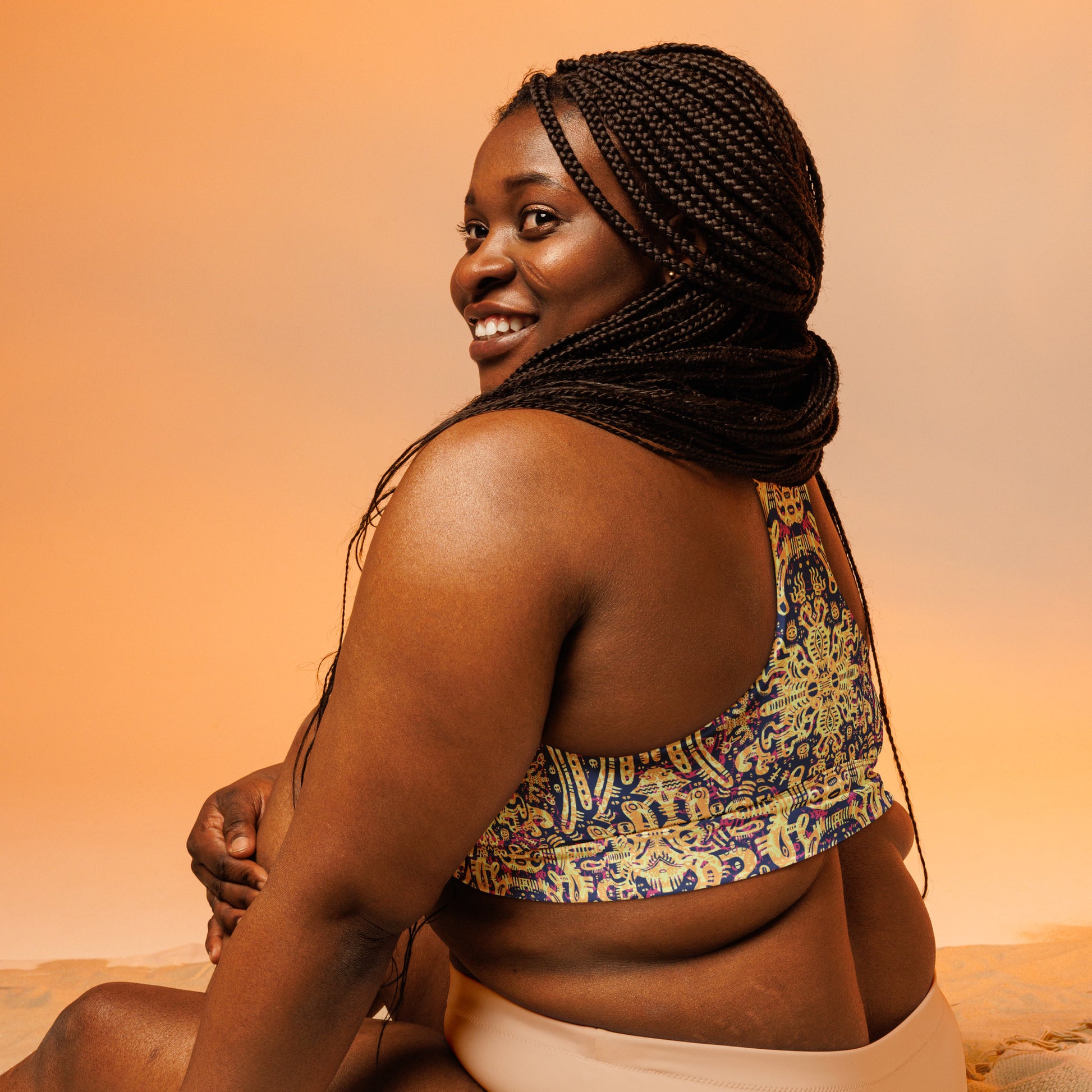 Blue, yellow and pink psychedelic crop top inspired by octopuses – exclusive ocean-themed design by Fowl Plays Print Emporium.