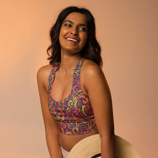 Blue, orange and pink psychedelic long line sports bra crop top inspired by ocean waves – exclusive sustainable design by Fowl Plays Print Emporium.