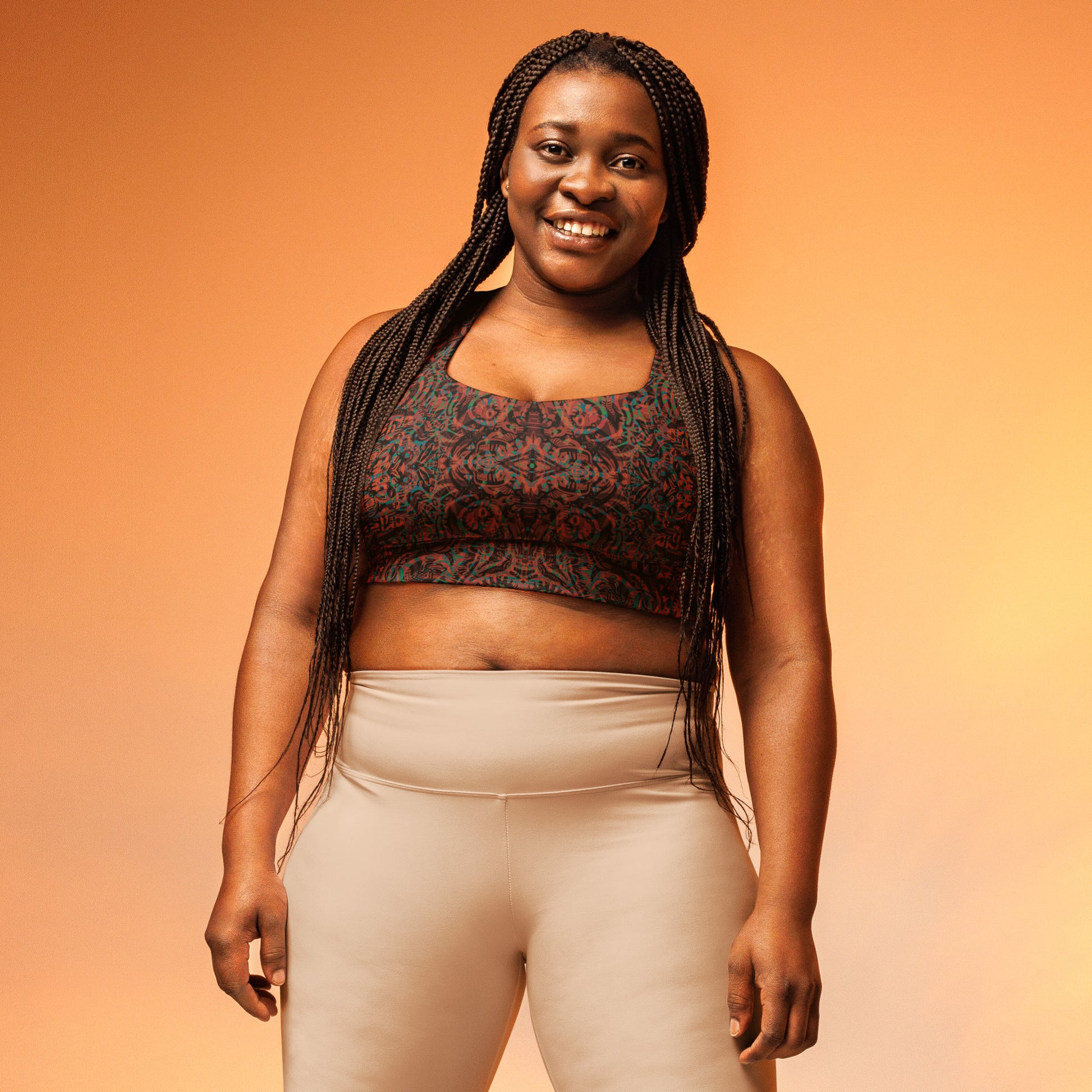 Psychedelic Kaleidoscope long line sports bra by Fowl Plays in burnt orange, green, and black psychedelic design, plus size