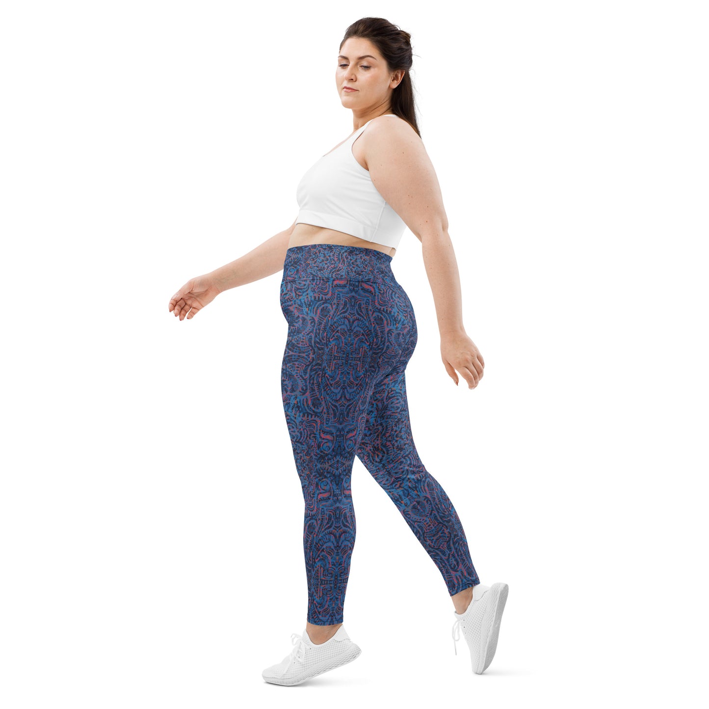 Model wearing blue tribal patterned leggings plus size
