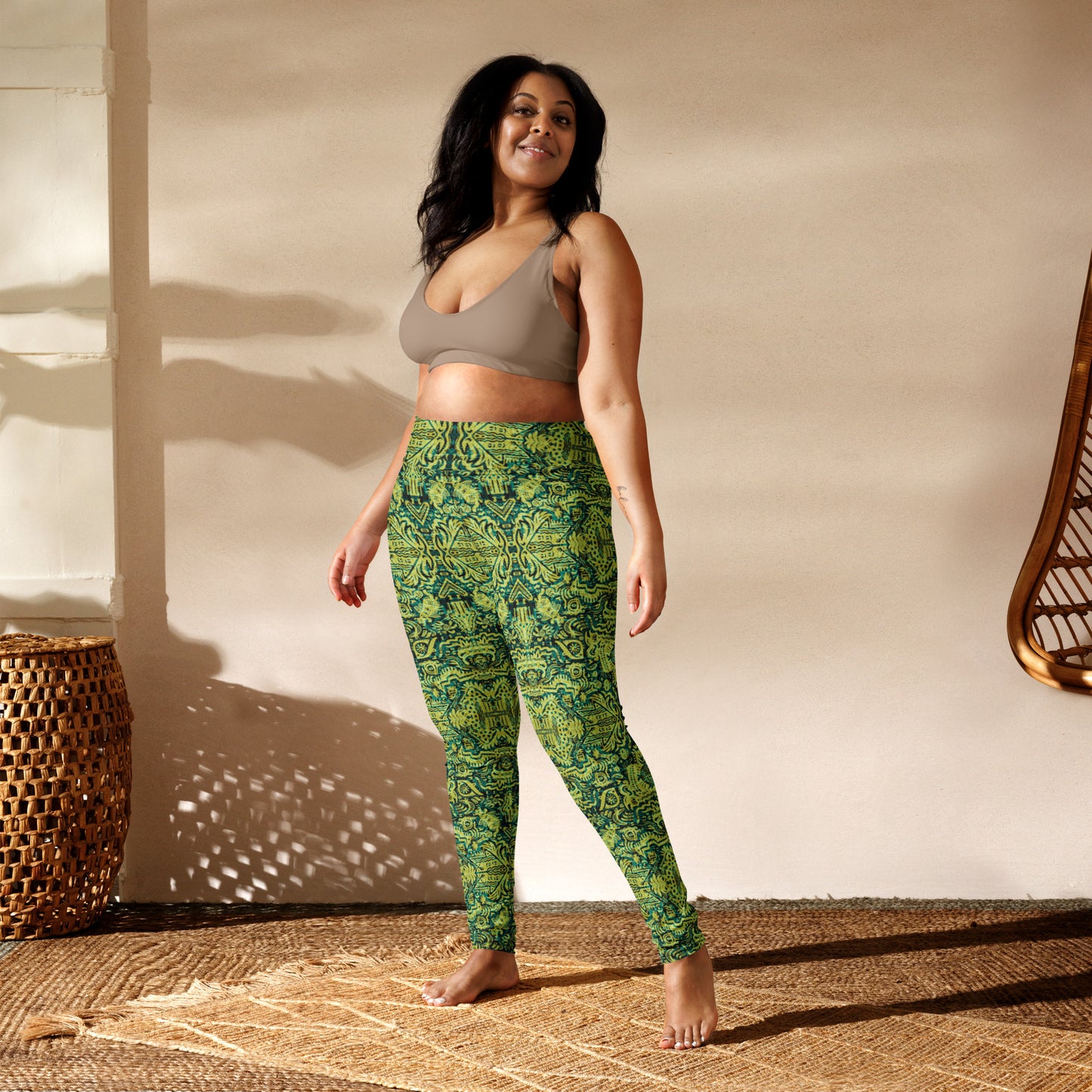 Green and lemon patterned plus size model wearing leggings inspired by the 90s dance scene, designed by Fowl Plays Print Emporium.