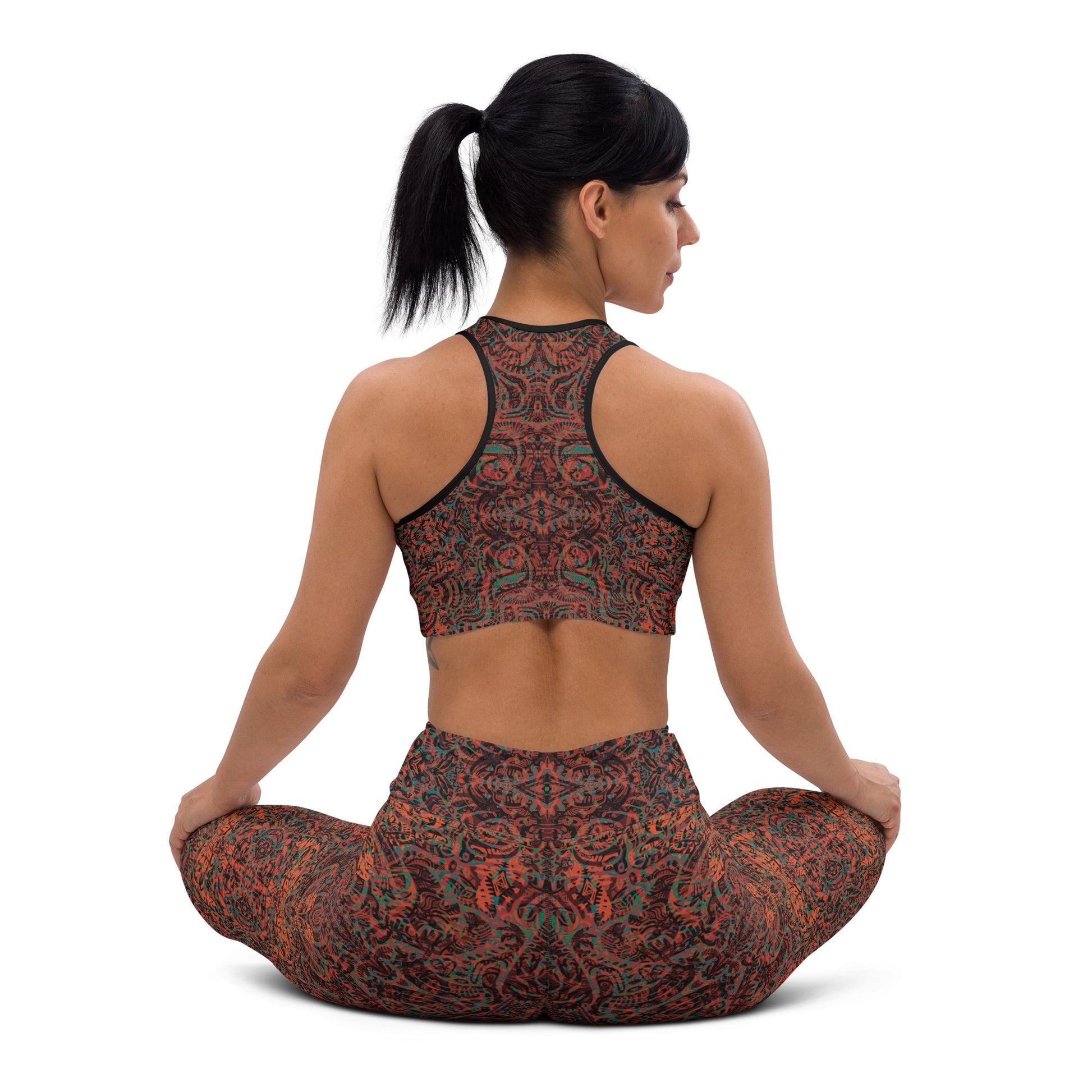 Model wearing kaleidoscope leggings and crop top in yoga pose back