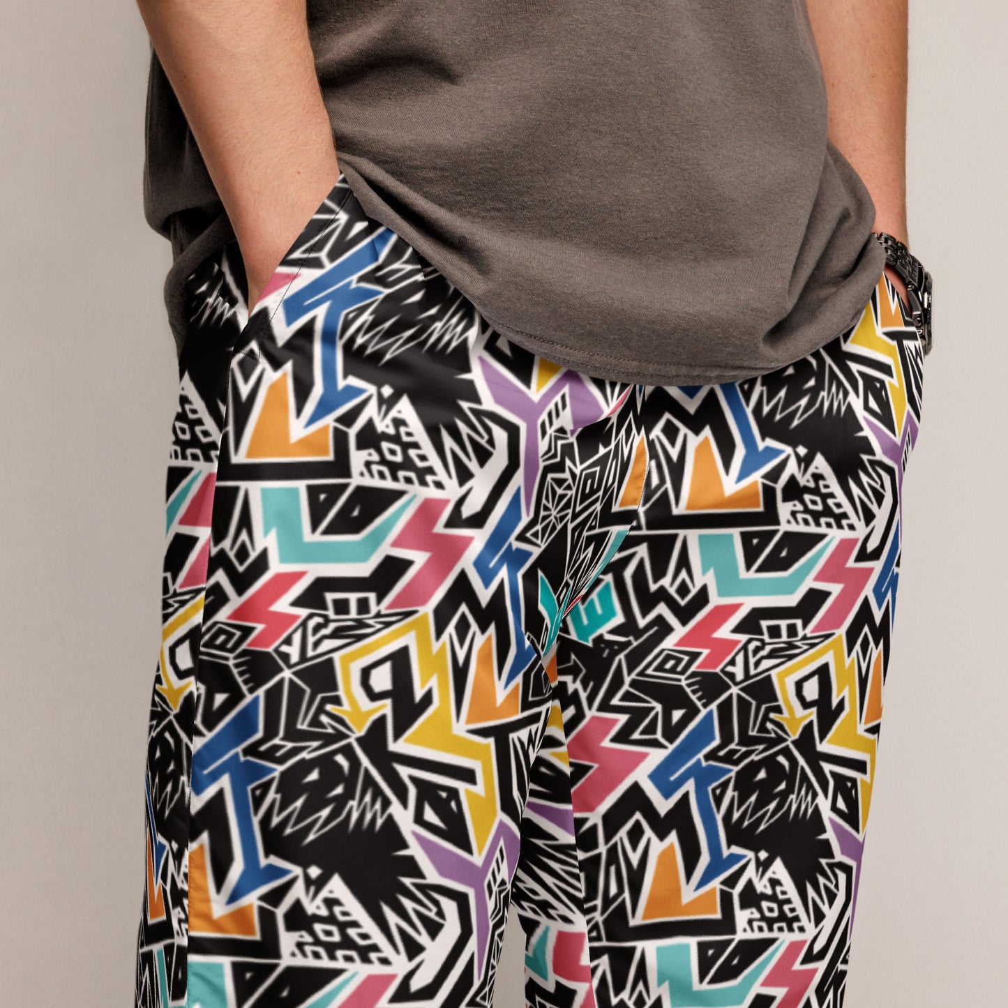 Colourful rainbow Smile At Life Joggers – unisex festival streetwear by Fowl Plays Print Emporium