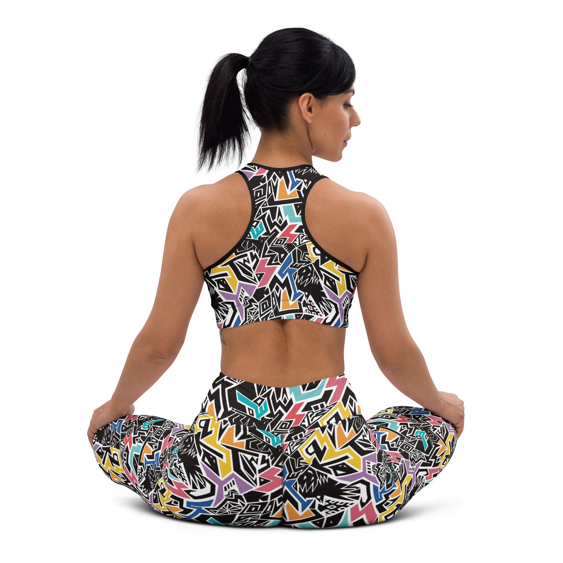 model wearing Rainbow patterned leggings and crop top with hidden ‘Smile At Life’ message, designed by Fowl Plays Print Emporium