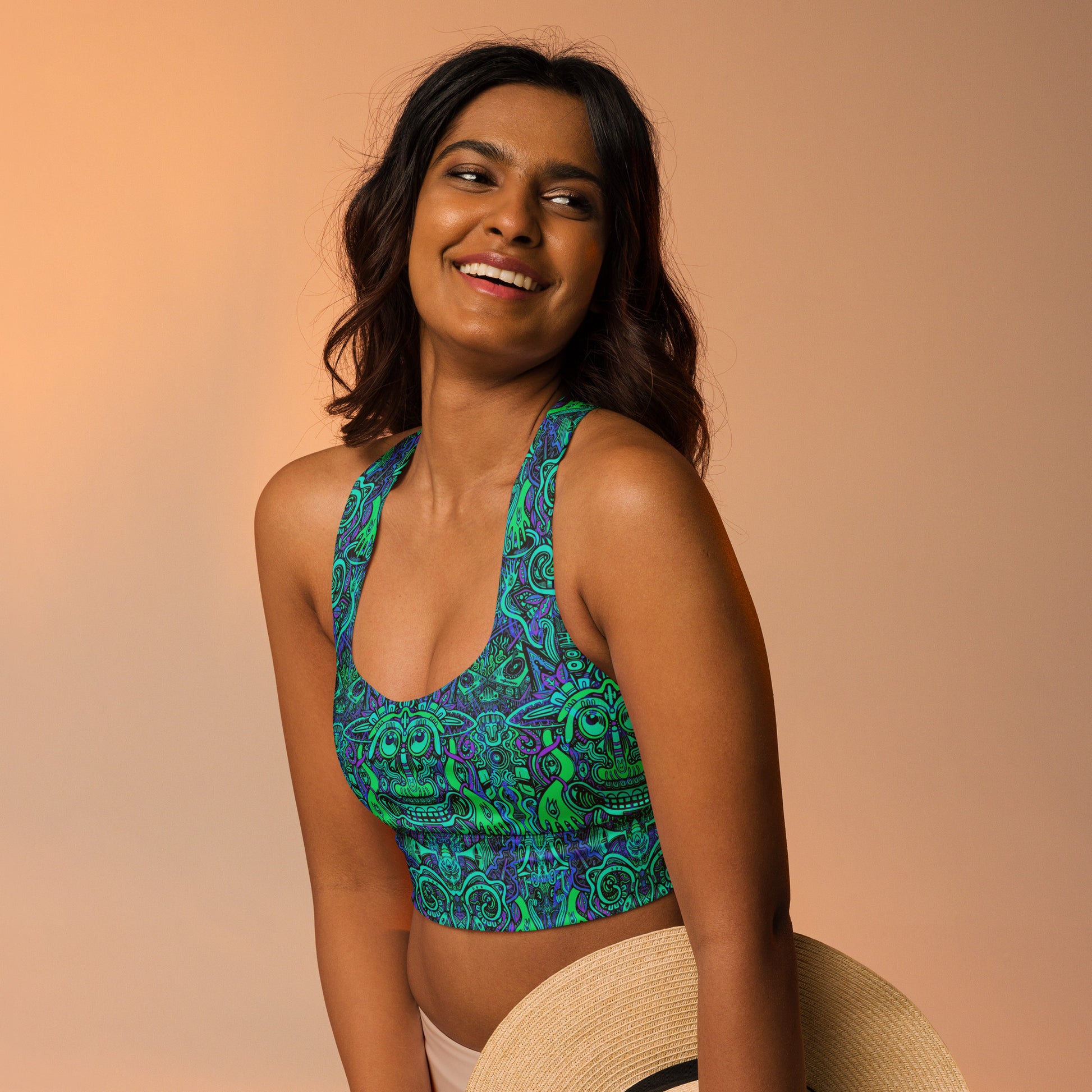 Psychedelic black, purple, and neon festival crop top sports bra inspired by rave culture – exclusive sustainable design by Fowl Plays Print Emporium.
