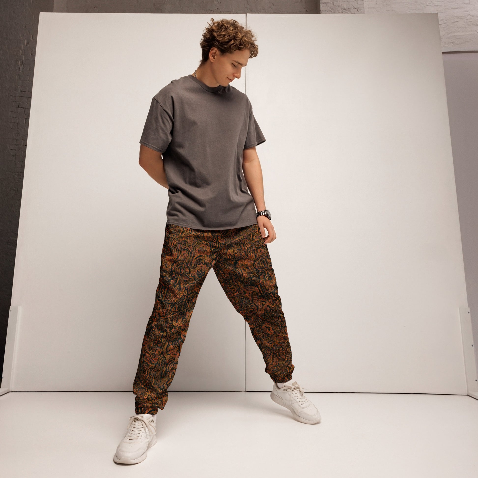 Brown and orange Dinosaur Nan Edition Joggers – unisex festival streetwear by Fowl Plays Print Emporium