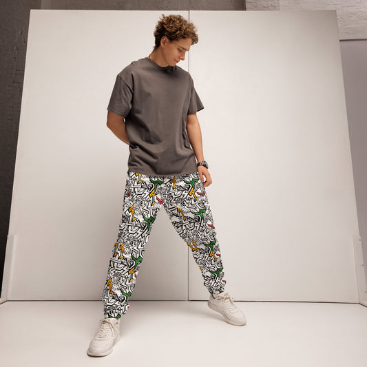 Red, gold, black and green Smile At Life Joggers – unisex festival streetwear by Fowl Plays Print Emporium